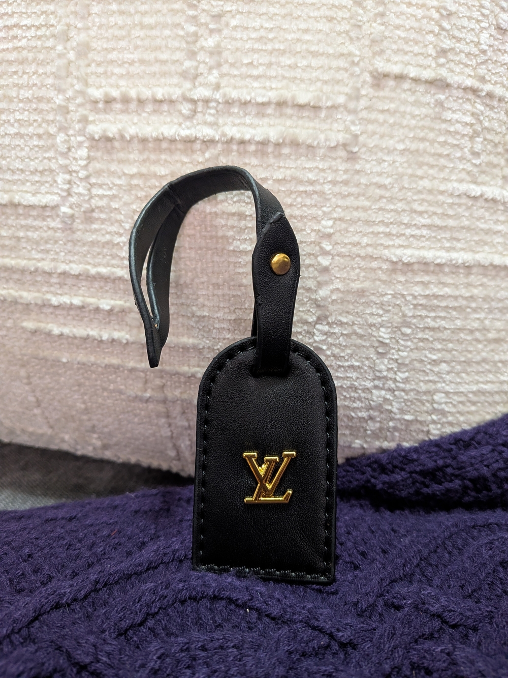 Black Leather Tag with Gold Emblem
